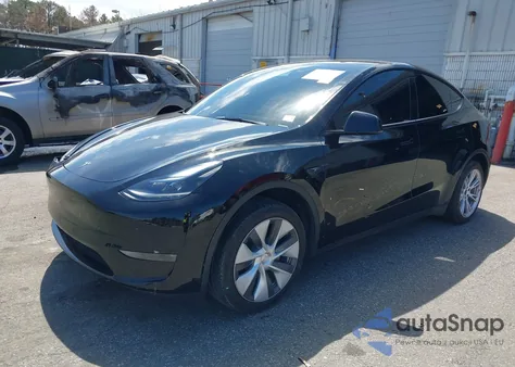 2023 Tesla Model Y Awd/Long Range Dual Motor All-Wheel Drive z USA, uszkodzony, nr VIN 7SAYGDEE5PA199763